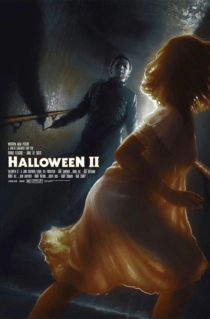 a movie poster for halloween ii with a woman in a dress and a man standing behind her