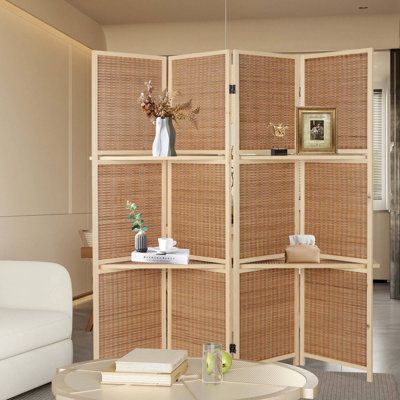 the room divider is made out of bamboo and has multiple shelves on each side