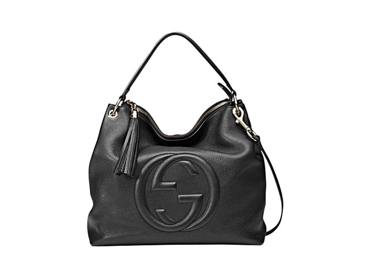 This black Gucci bag exudes luxury with its beautiful leather and gold-toned hardware. The famous interlocking GG logo is displayed proudly on the front. With a zipper pocket and two open pockets befitting of a phone, you'll have space to organize what you need to bring with you.     Model: 536194     Black Leather  Gold-tone Hardware  GG Soho  Top Zip Closure  Leather Shoulder Strap  Removable/Adjustable Shoulder Strap  Three Interior pockets  Strap Drop: 5"   Measurements: 13.5" x 5.5" x 13" ( Gucci Shoulder Bag With Logo Hardware For Business, Gucci Leather Shoulder Bag With Logo Hardware, Gucci Shoulder Bag With Logo, Classic Gucci Shoulder Bag With Logo, Gucci Shoulder Bag With Logo Hardware, Gucci Shoulder Bag With Logo Hardware For Everyday Use, Gucci Crossbody Shoulder Bag With Logo Hardware, Modern Gucci Bag With Logo Hardware, Gucci Rectangular Bag With Logo Hardware