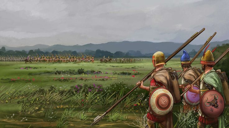 two men dressed in roman armor holding spears and shield standing next to each other on a lush green field