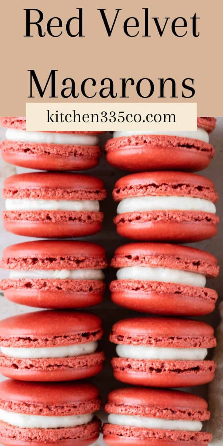 red velvet macarons are stacked on top of each other with white frosting