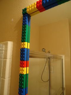 a bathroom mirror made out of legos in the shape of a building block frame