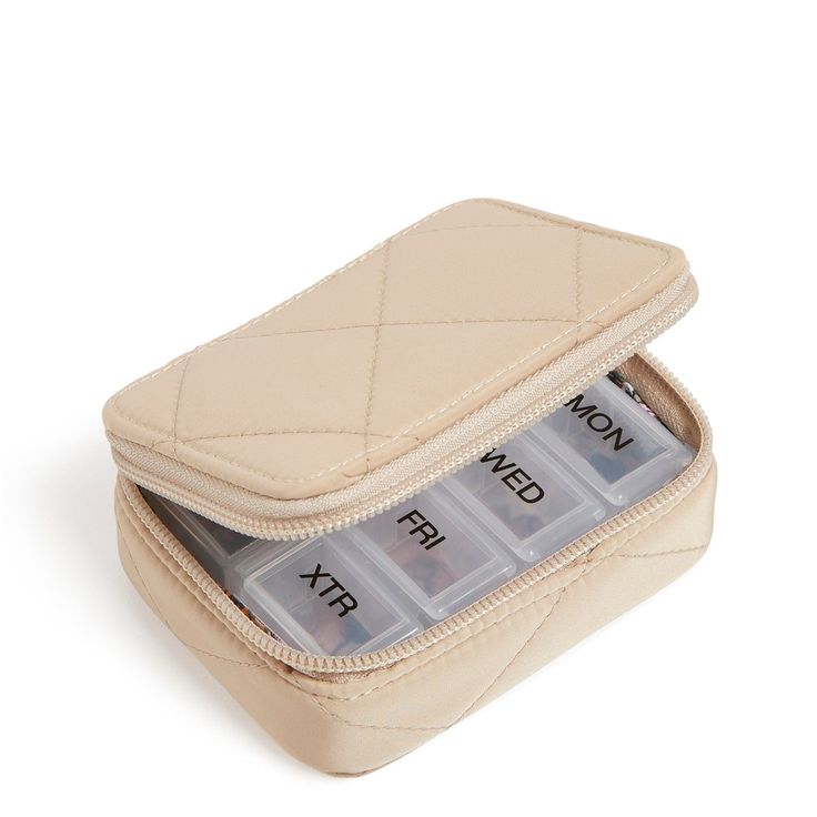 the zippered case has four compartments in it