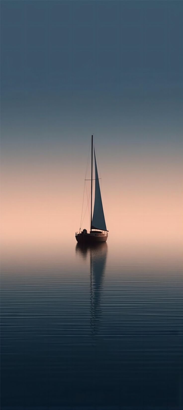 a sailboat floating in the ocean on a foggy day