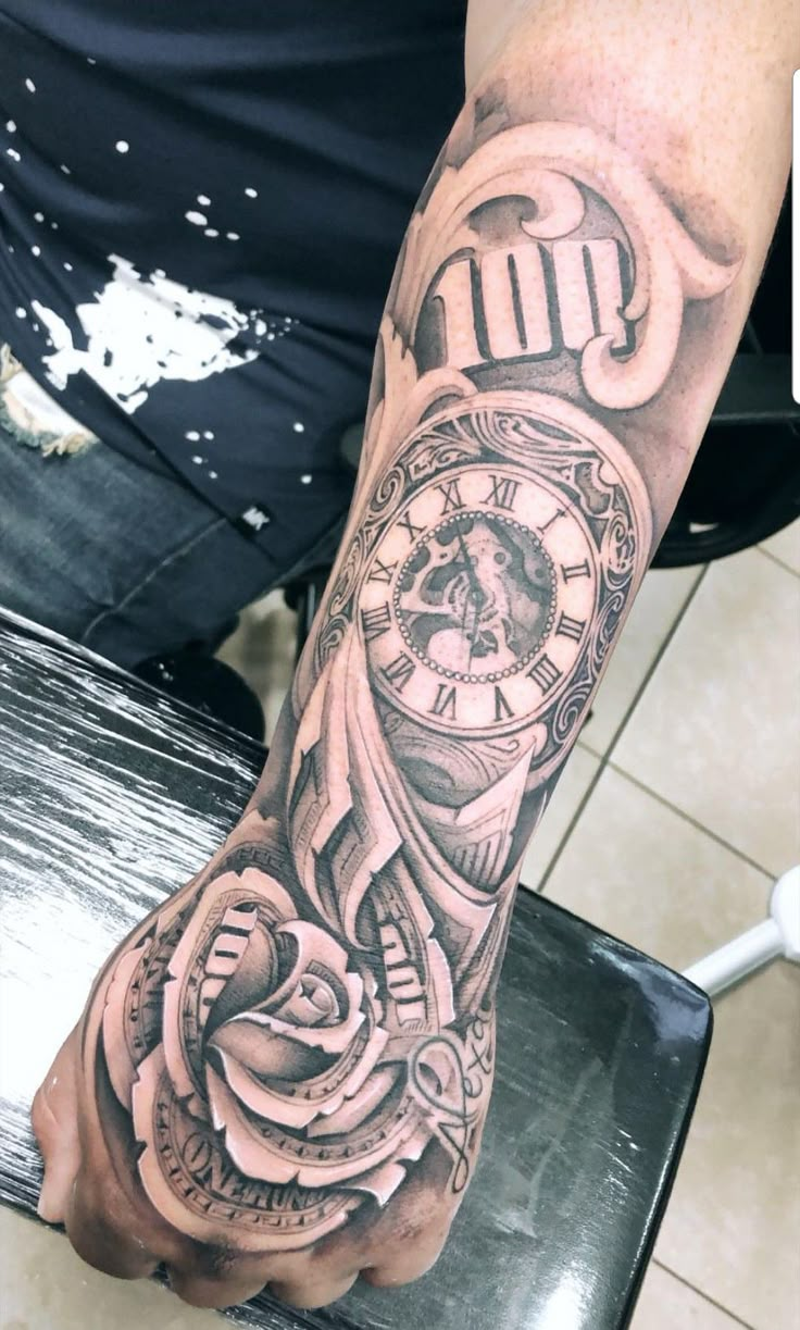 a man with a clock tattoo on his arm