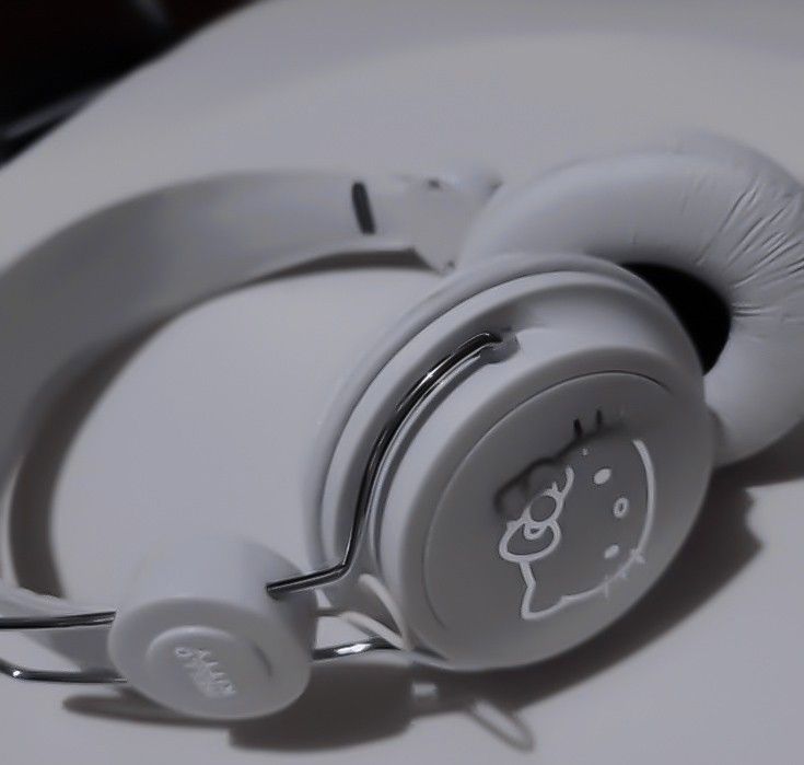 a pair of headphones sitting on top of a table