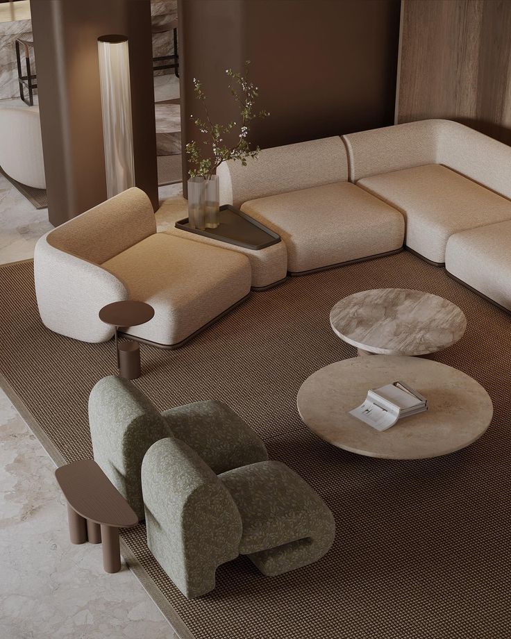 a living room filled with lots of furniture next to a table and chair on top of a rug