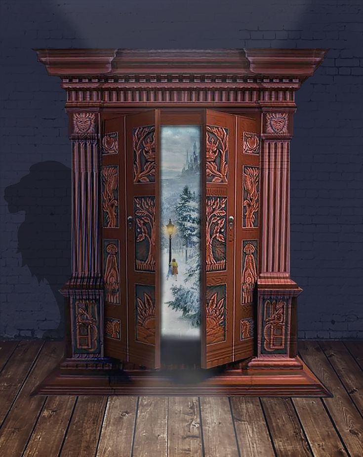 an open door with a snowy scene on the wall behind it in front of a brick wall