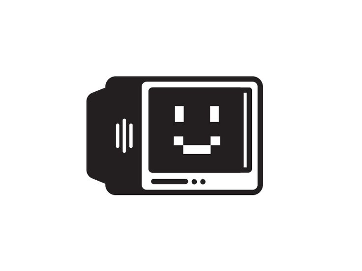 a black and white computer monitor with an emoticive face on it's screen