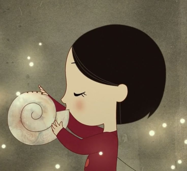 a woman holding a snail in her right hand and looking at it's shell