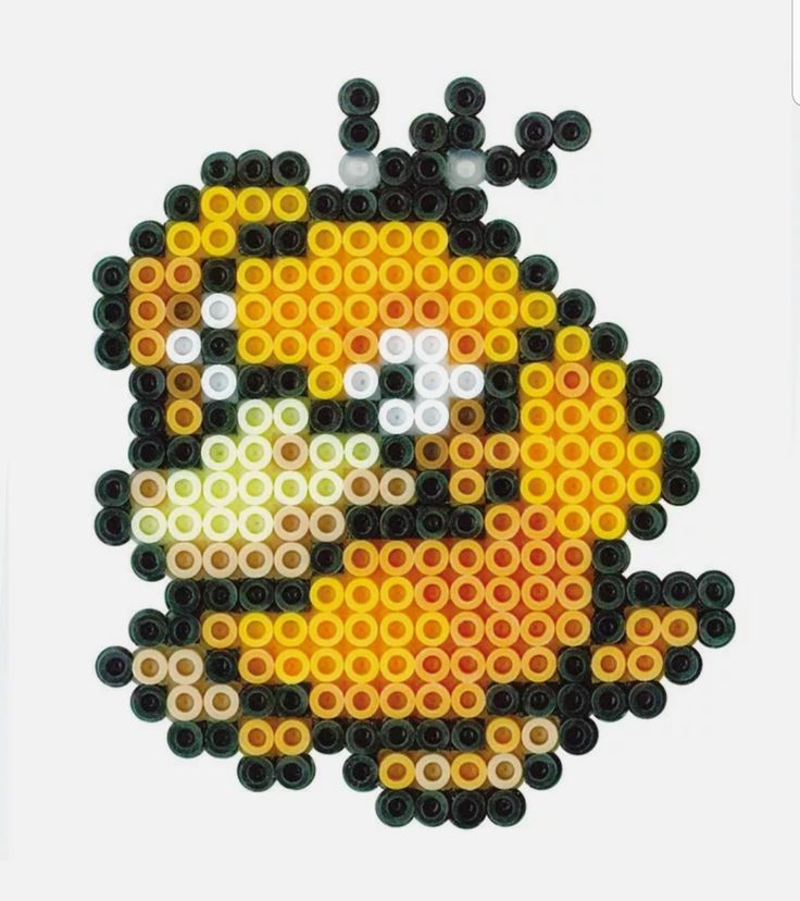 the pixel art is made out of legos and has an angry face on it