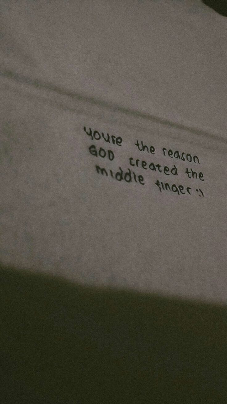 a close up of a piece of paper with writing on it that says, you're the reason god created the middle finger