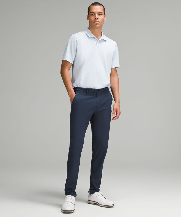 From first swing to the final round, these golf pants are at the top of their game. Integrated ventilation and stretch fabric deliver comfort that lasts on and off the course. Designed for Golf. Streamlined fit that skims glutes and thighs. Stretch elastic panels on the waistband. Ventilated gusset. Secure back pockets fit your phone and score cards. Small drop-in pocket on the right-hand side for golf tees. Flip up the cuffs to reveal reflective details. Golf Tees, Short Coat Jackets, Golf Pants, Jogger Shorts, Business Casual Outfits, Hoodie Top, Mens Trousers, Mens Bottom, Jacket Tops