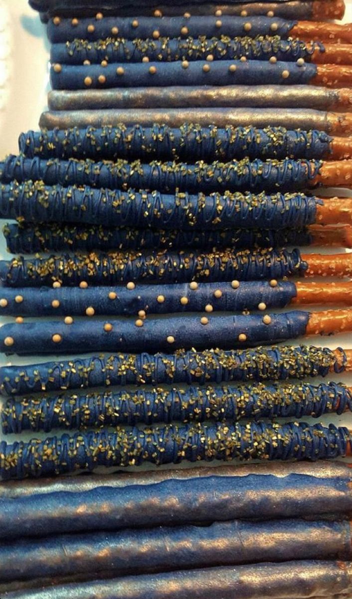 blue and gold beads are stacked on top of each other