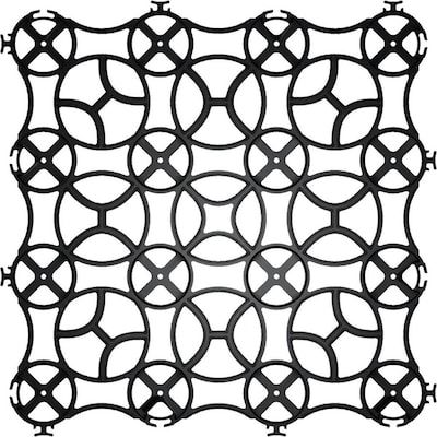 a black and white image of an intricate design on a sheet of paper with circles in the center