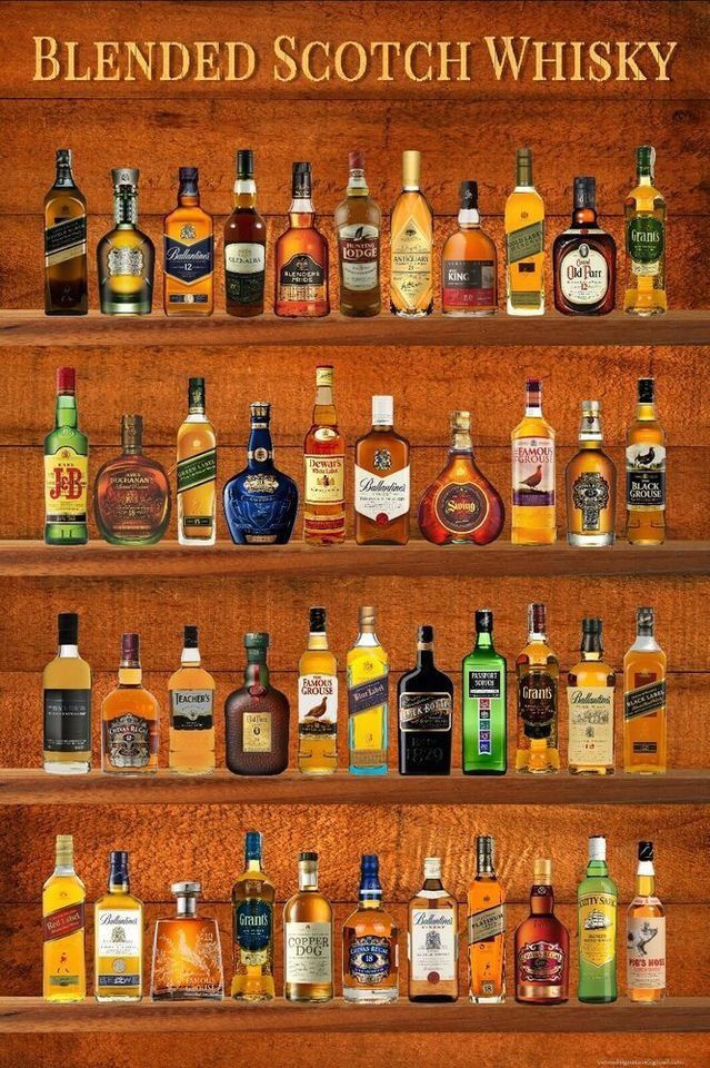 a wooden shelf filled with lots of bottles