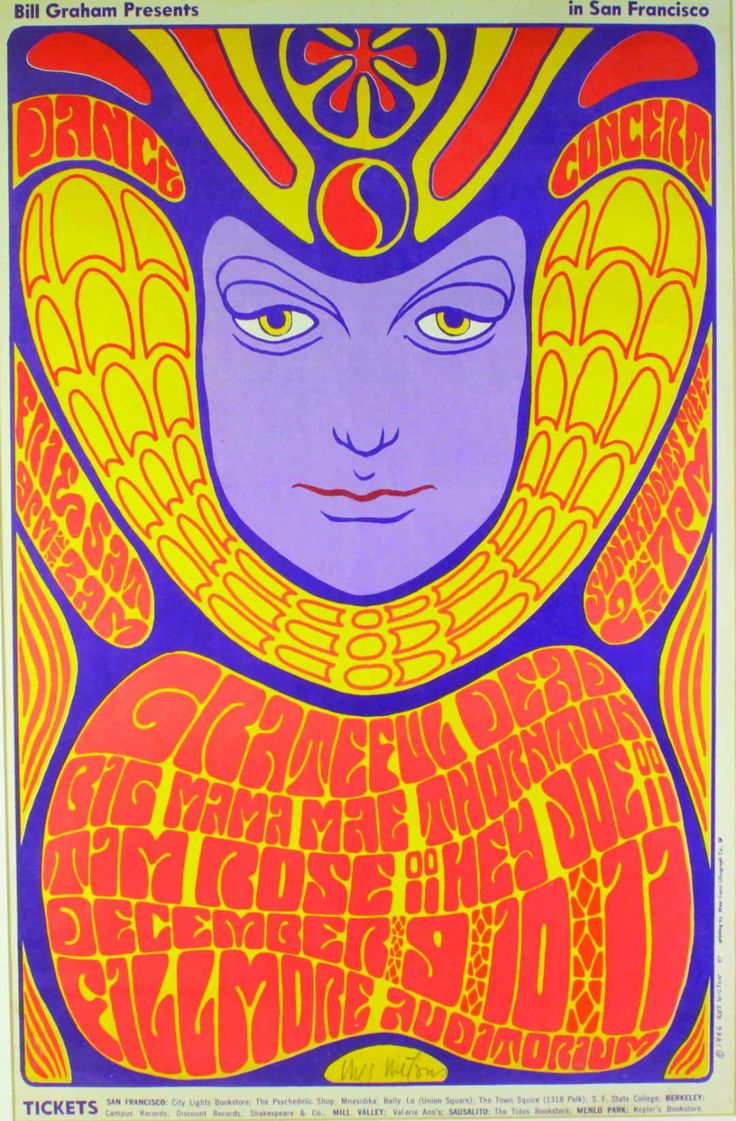 an old concert poster from the 1970's shows a woman with blue eyes and yellow headdress