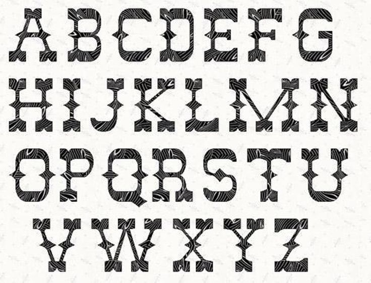 an old fashioned font that has been drawn in black and white with the letter's lower