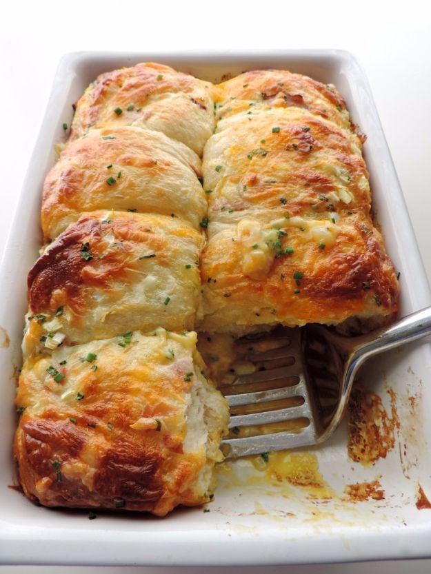 a casserole in a white dish with a fork sticking out of the side