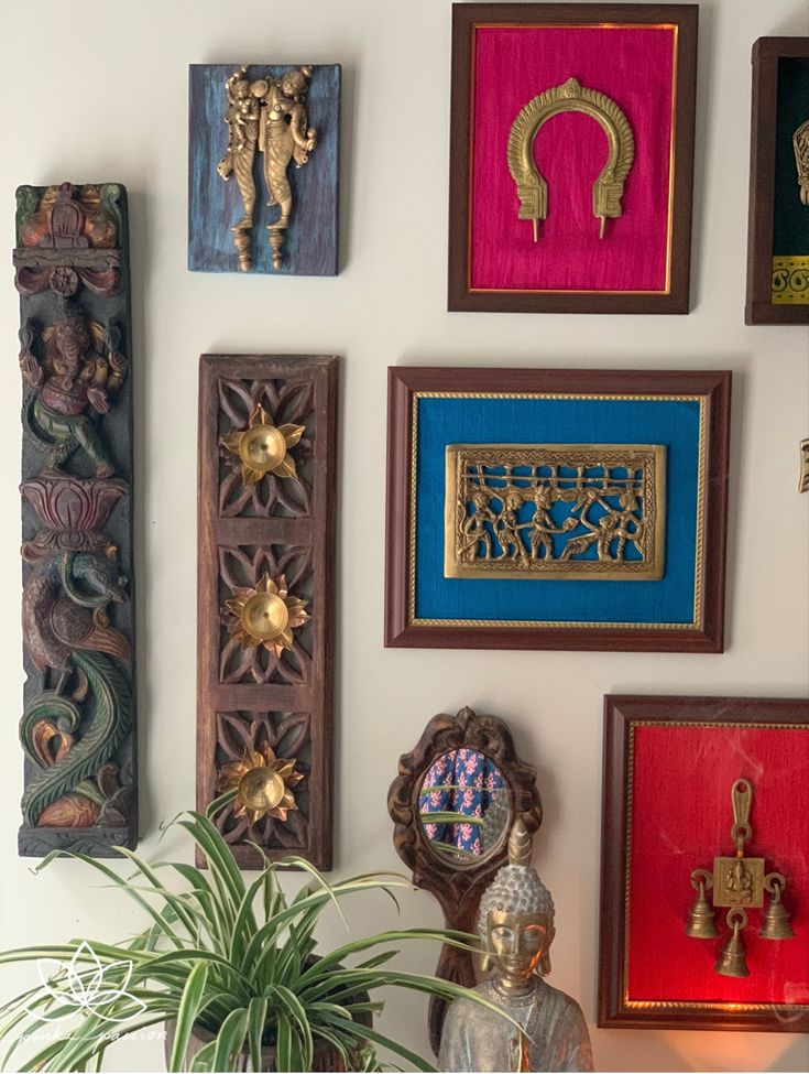 there are many framed pictures on the wall with plants in vases and other decorative items