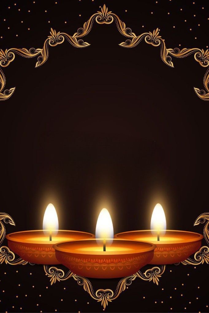 three lit candles in front of a black background with gold trimmings and an ornate frame