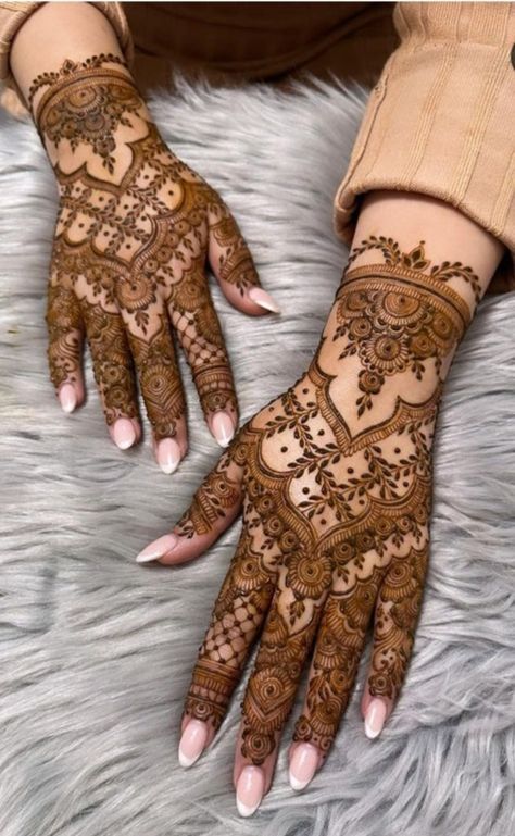 henna tattoo on the hands of a woman