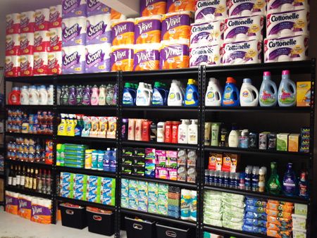 a grocery store filled with lots of different types of milk and juices on shelves