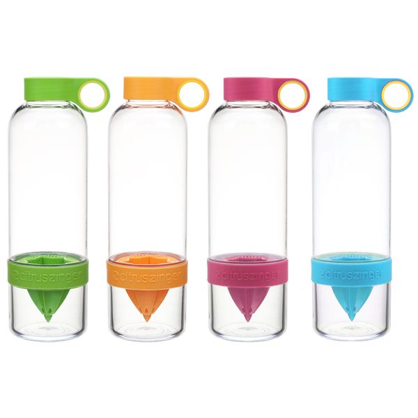 three glass water bottles with lids and handles