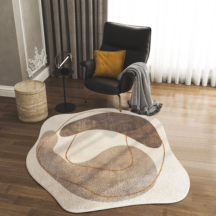 a living room with a chair and rug on the floor