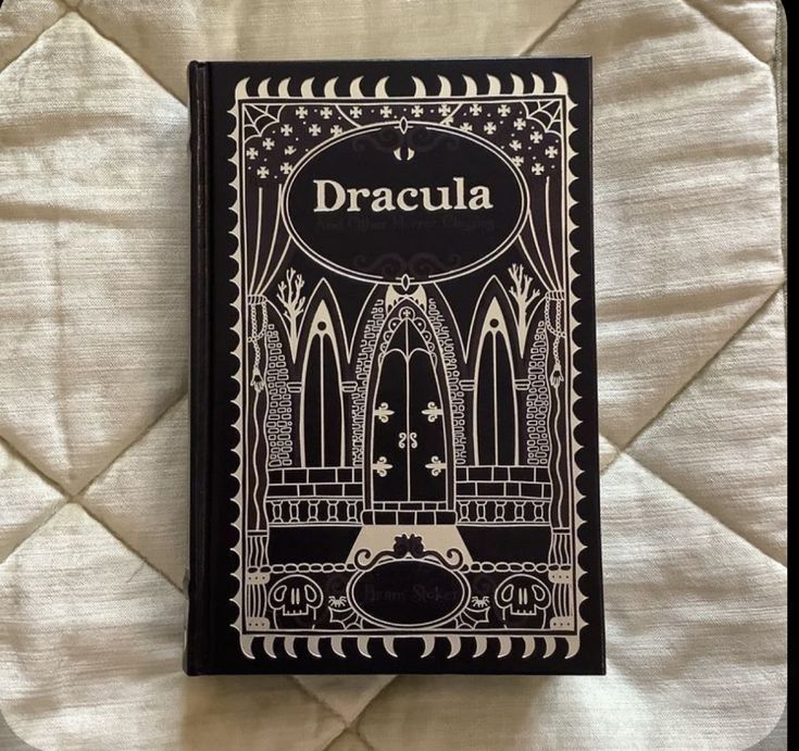 a black and white book with the word dracula on it