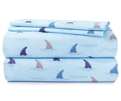 two sheets with sail boats on them