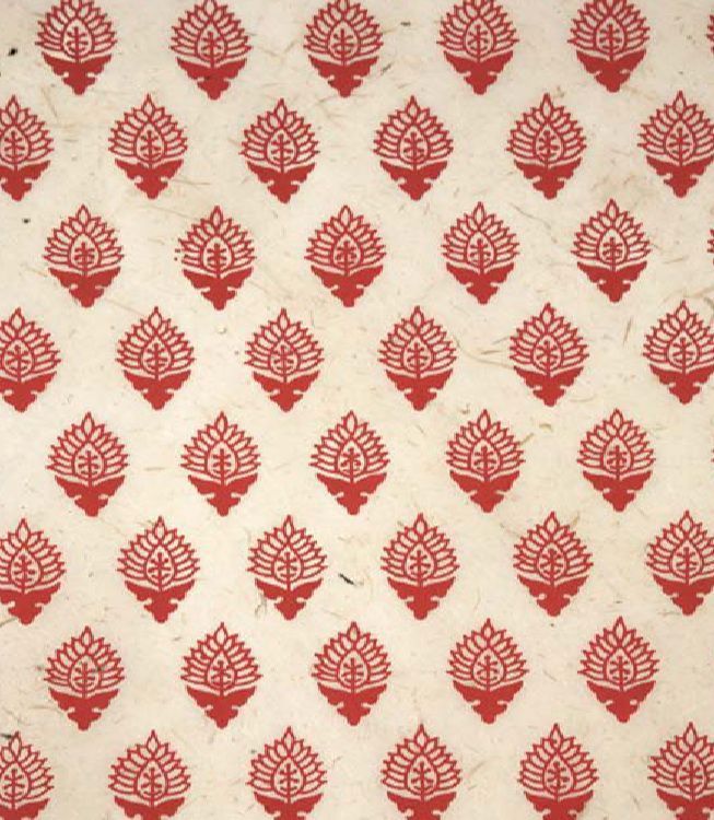 an old red and white wallpaper with leaves on it