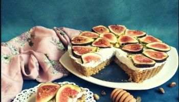 there is a cake with many slices cut out and on the plate next to it