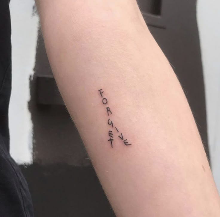 a person with a tattoo on their arm that says, to do or not?