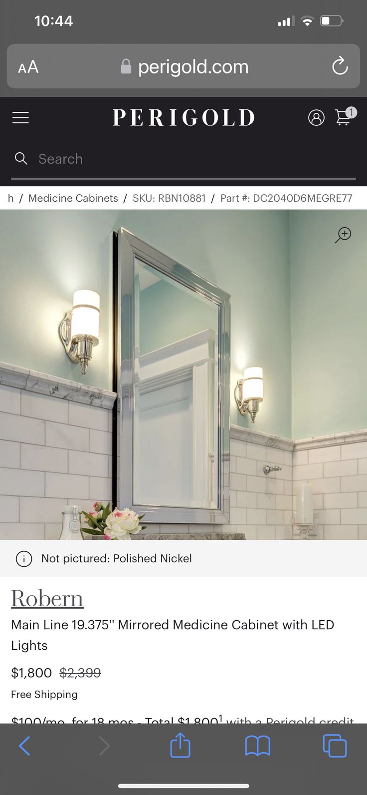 an image of a bathroom with white tile on the walls and floor, in front of a mirror that reads perigoold com