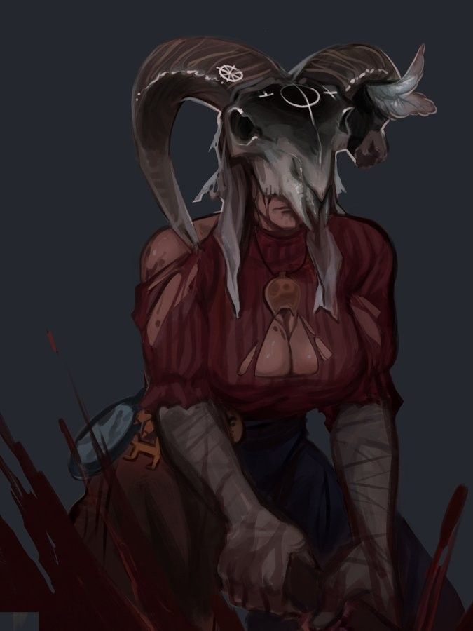 a woman with horns sitting on the ground