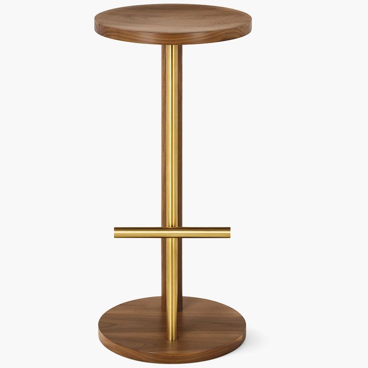 a wooden stool with a metal cross on the bottom and a wood seat at the base