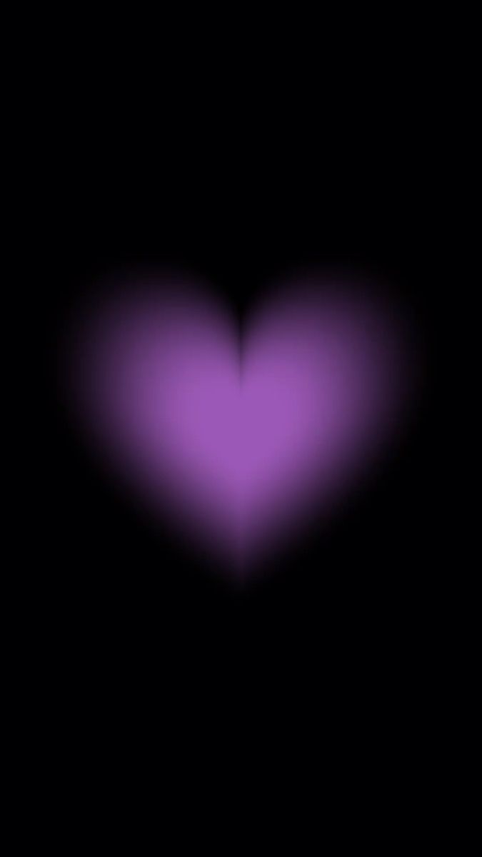 a purple heart on a black background