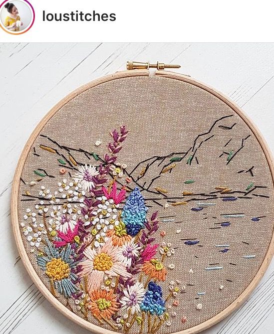 an embroidery project with flowers on it