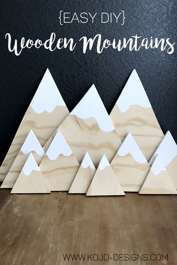 wooden mountains with the text easy diy wooden mountains on it, and an image of mountain