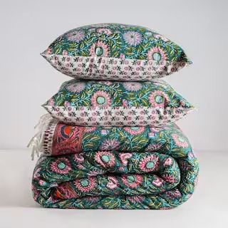 three pillows stacked on top of each other