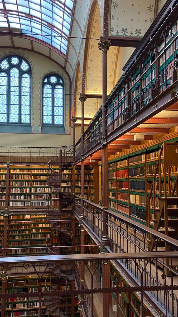 the interior of a library with many bookshelves