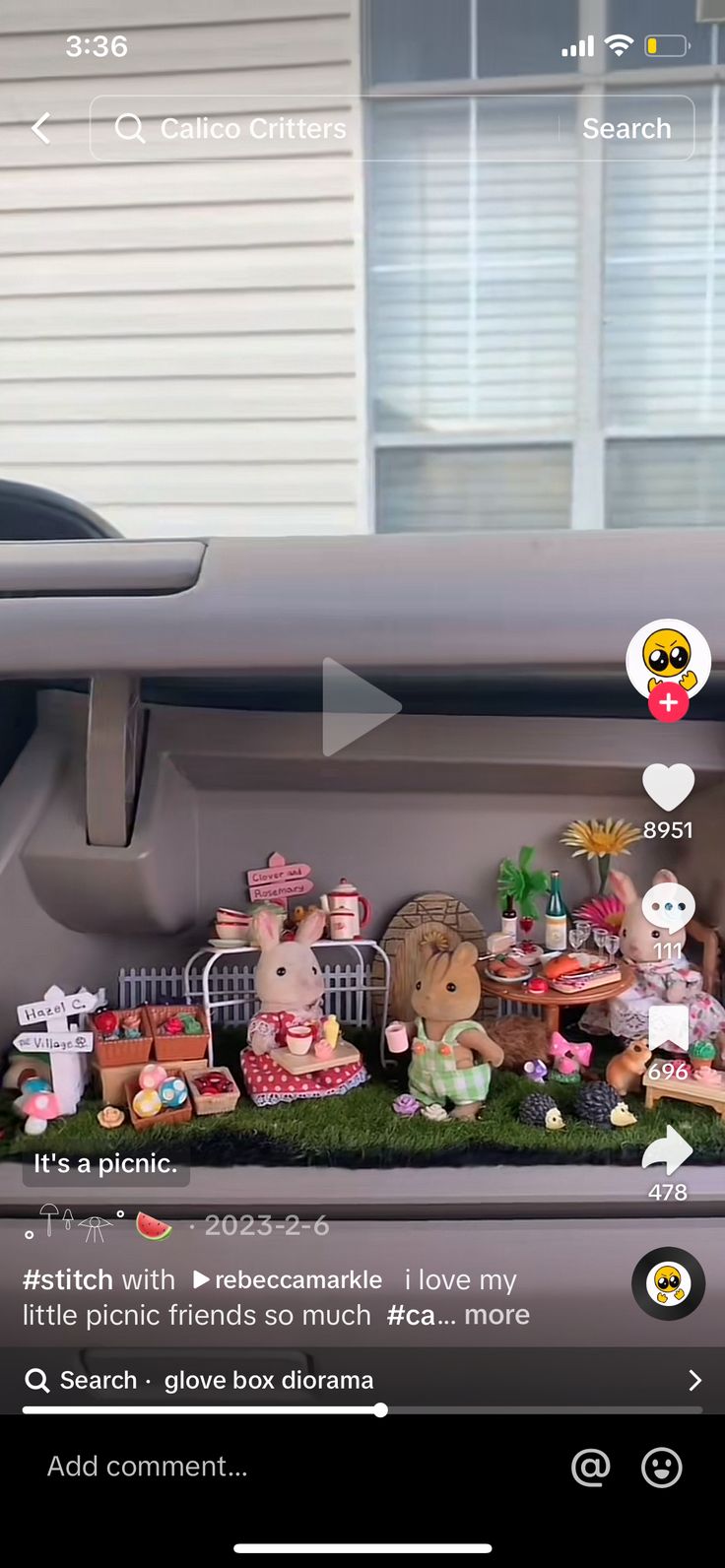 a car dashboard with an assortment of stuffed animals on it