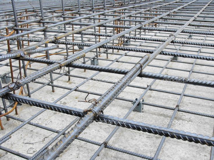 steel bars are laid out on the ground