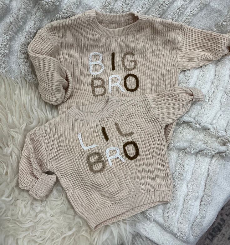 Pale beige personalised oversized sweater with the words 'BIG BRO' or 'LIL BRO' in neutral shades, hand embroidered.  Sizes start from 6months up to 5years. Sizing is generous as the jumpers are designed to be oversized. The wool colour examples for the embroidery are as shown, however due to monitor/screen lighting, the colours might differ slightly.  This item is not refundable or exchangeable as each item is made to order. Please ensure that you wash on a low heat and delicate wash/ hand wash Embroidery Sweaters, Jumper Ideas, Embroidered Jumper, Lil Bro, Pale Beige, Sweater Ideas, Big Brother Shirt, Kids Jumpers, Embroidery Sweater