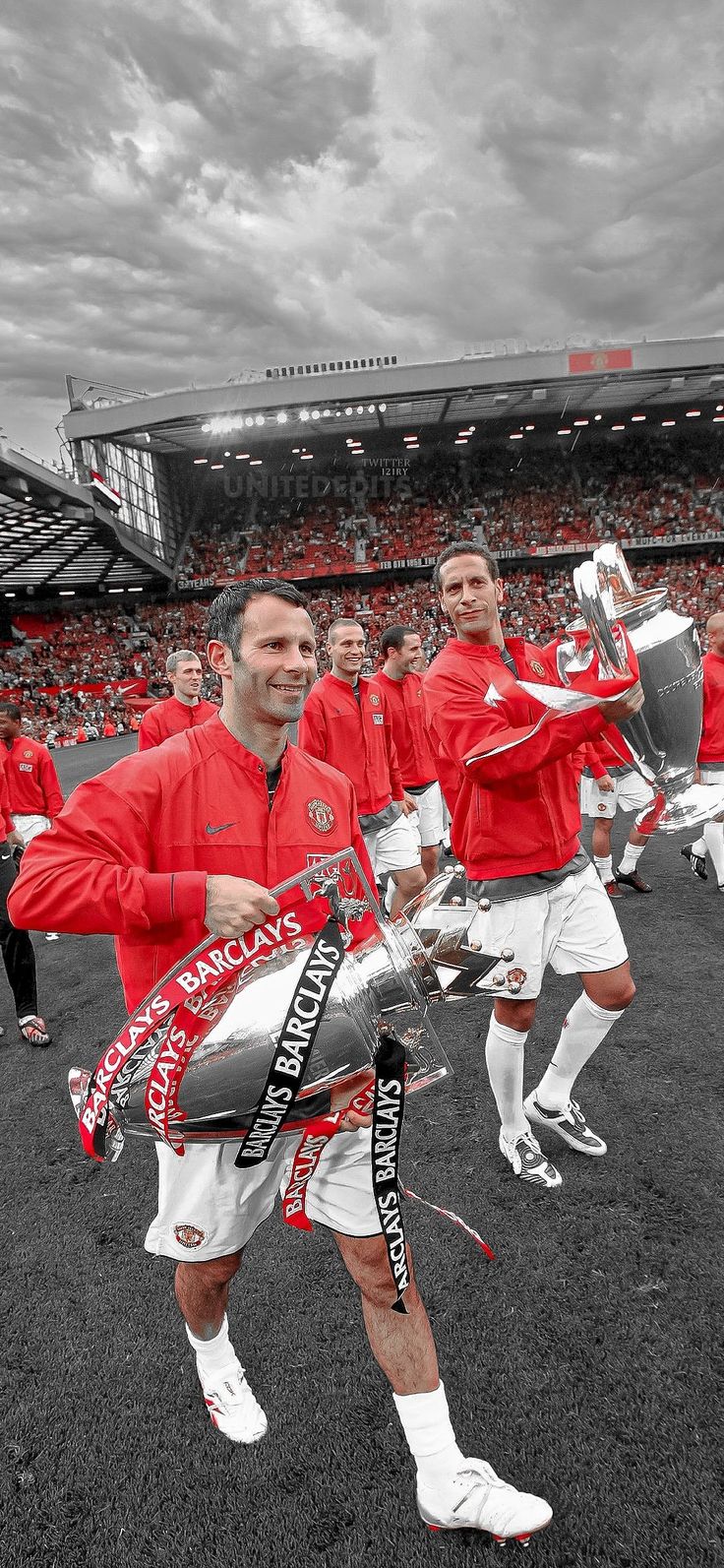 the soccer players are holding their trophies