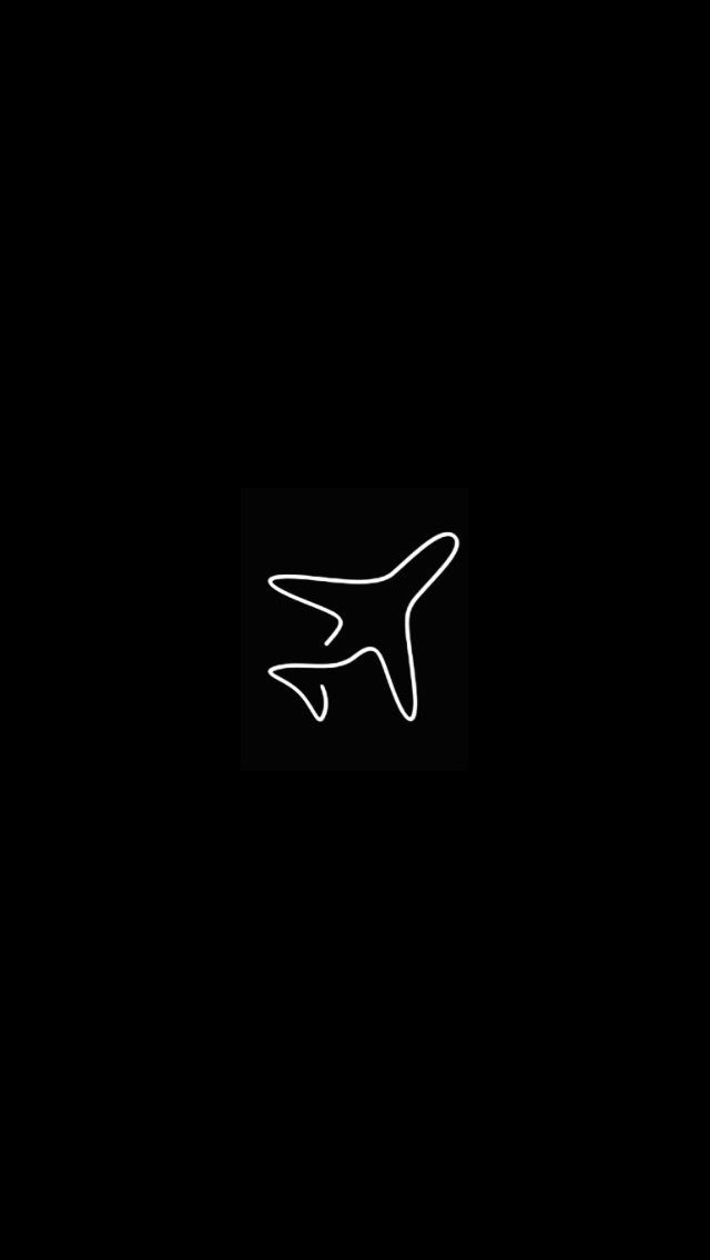 an airplane is flying in the dark with white lines on it's side and bottom