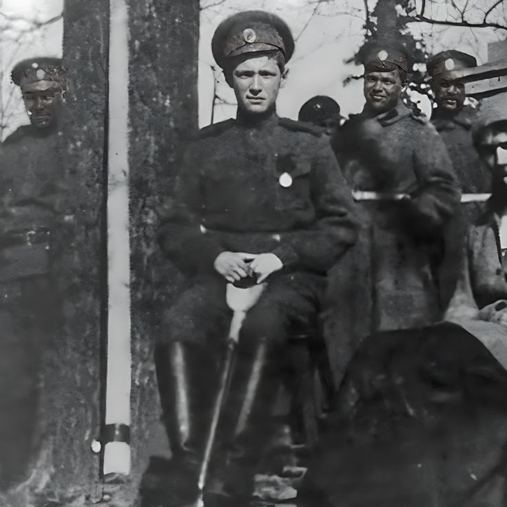 an old black and white photo of men in uniforms