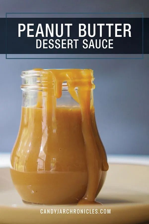 peanut butter dessert sauce in a glass jar on a plate with the words, peanut butter dessert sauce