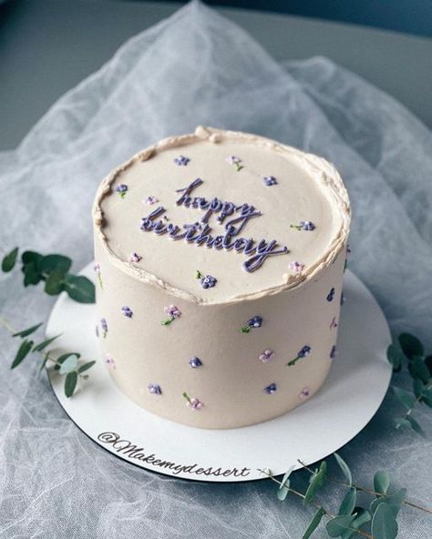 a birthday cake sitting on top of a white plate